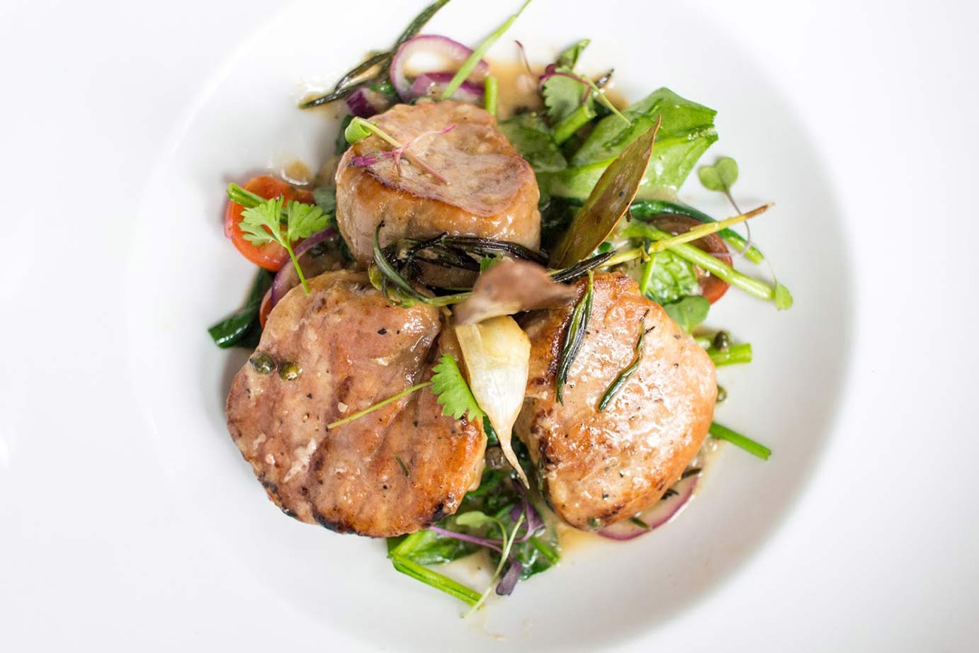 photo of pork chops with vegetable meal